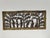 This decorative panel is an example of Dhokra art, a traditional bell-shaped metal casting technique from India, often...
