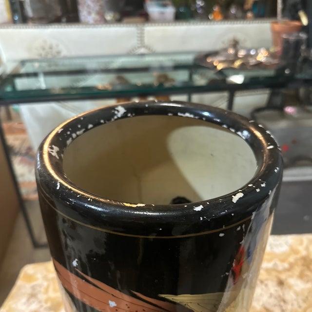 Up for consideration is a beautiful vintage Asian style black ceramic umbrella stand. This would look lovely in your...