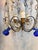 Precious 19th century chandeliers with deep blue and clear crystal pendents with antique brass fittings. One of a stunning...