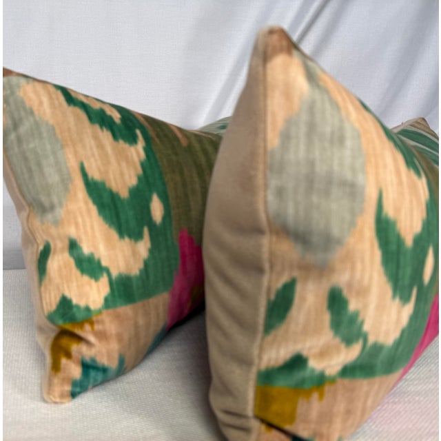 Custom pair of 12"x22" pillows covered in Pierre Frey "Bella Coola" in acid lime and backed in a coordinating beige...