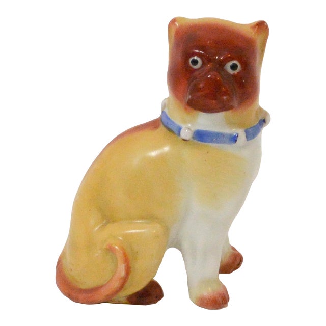 Antique Late 19th Century Porcelain Seated Pug Figurine For Sale