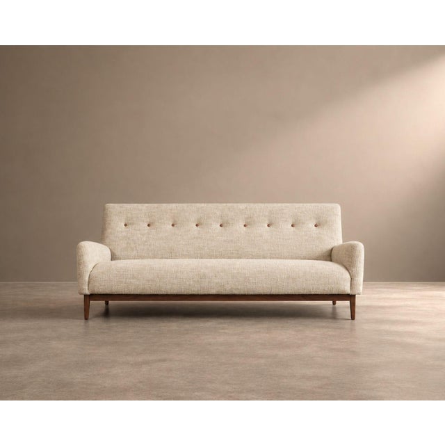 An exceptional example of mid-century modern design, this Model U-150 sofa by Jens Risom, circa 1950s, showcases the...