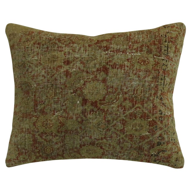 Pillow made from a 19th century fine quality Persian Tabriz rug featuring a Herati design on a rusty red ground. Measures:...