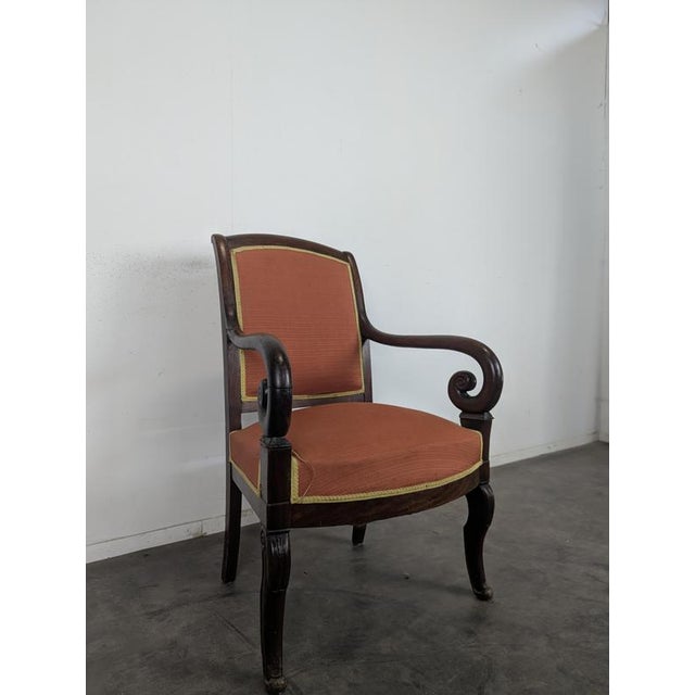 Restoration Style Mahogany Armchair with Curved Armrests and Orange Fabric, in Very Good conditions. Designed before 1890