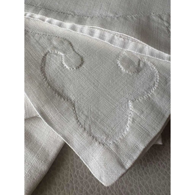 "A beautiful and quietly refined set of five antique cotton napkins, crafted from exceptionally soft, fine quality cotton...