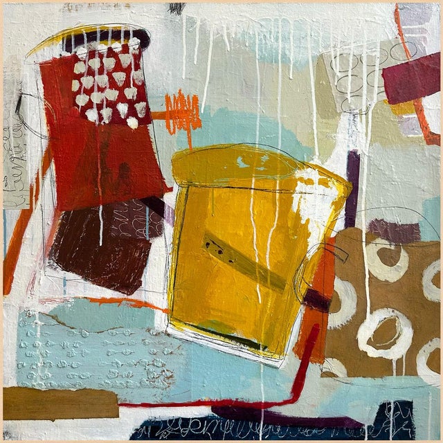 A golden-yellow pitcher or jug tips across a field of aqua, cream and rust, surrounded by patterned blocks, scrawled...
