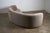 Elegant curved sofa has a distinct crescent or "kidney bean" shape that invites conversation and adds a seamless flow to...