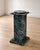 A beautifully crafted custom marble display pedestal, handcrafted by an Italian stone artisan in Los Angeles from richly...