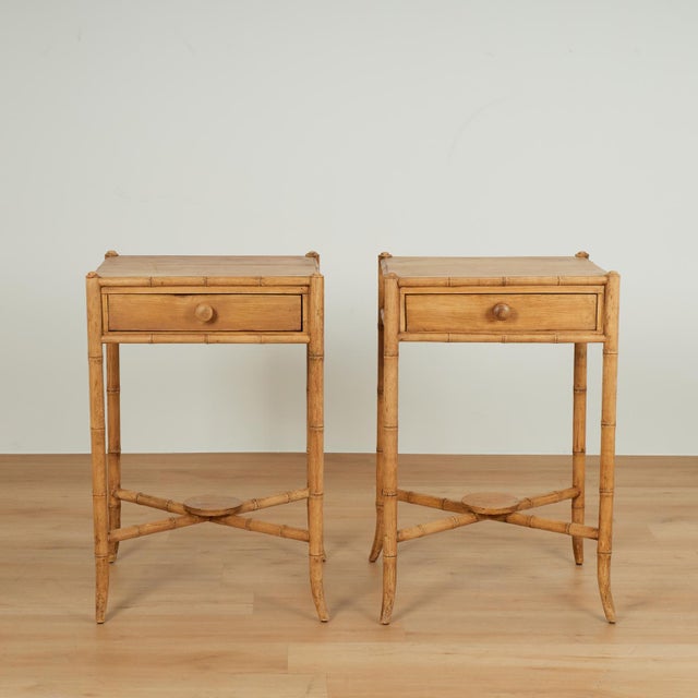 Handsome pair of 19th century English stands handcrafted in pine with a one drawer case on faux bamboo legs, cross...