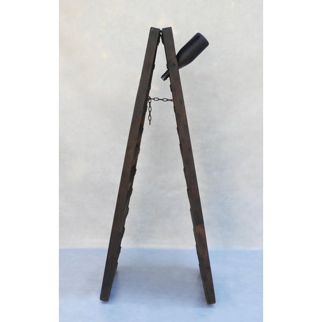 Vintage 100 bottle champagne rack or wine riddler from mid-century France C1950. A freestanding A-frame rack in solid oak,...