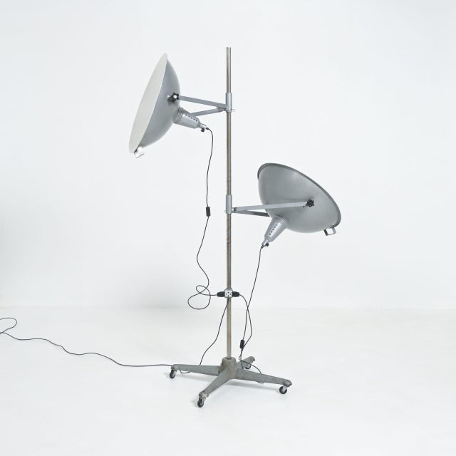This great studio floor lamp was produced by Narita in Belgium in the 1950s. This impressive lamp is mobile on its 4...