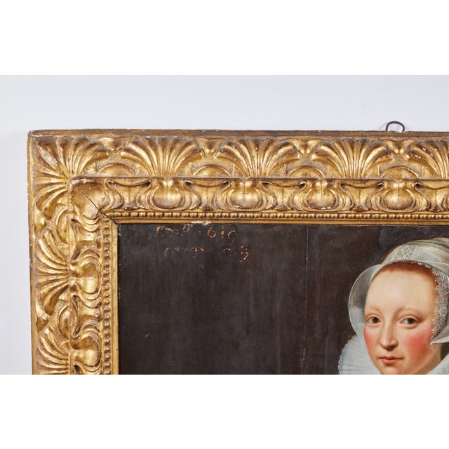 A beautifully painted Baroque style oil on board portrait of a lady wearing an embroidered top with ruffled collar. Her...