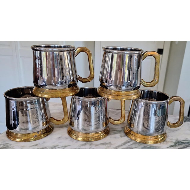 Here is a set of solid, sturdy drink mugs made of stainless steel and brass. The highest quality for barware, these show...