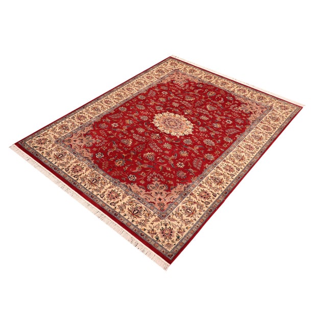 Designed with mesmerizing intricacy and gorgeous color palette, this hand-knotted masterpiece demonstrates the beauty and...