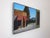 Contemporary Daytime Secret by Emma Kalff | Oil on panel Painting of a street scene with buildings and mountains. For Sale - Image 3 of 5