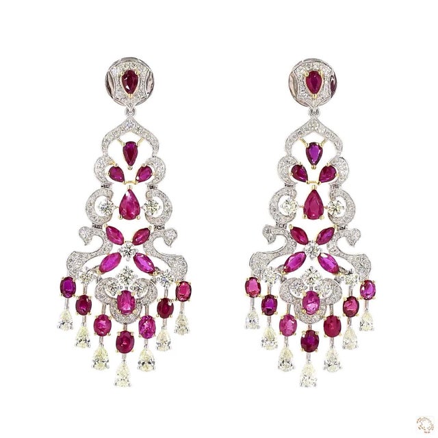 This pair of drop earrings from our contemporary estate collection centers on a 3.49-carat diamond in a round brilliant...