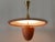 Extremely rare, lovely and highly decorative mid-century modern two-flamed pendant lamp or chandelier. Designed and...