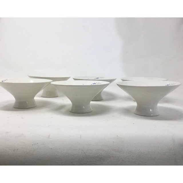 This rare set of six footed bowls, circa 1950, was designed by renowned industrial designer Ben Seibel for the Iroquois...