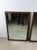 This pair of mid century modern mirrors feature beveled walnut frames with slight rounded edge, original walnut finish,...