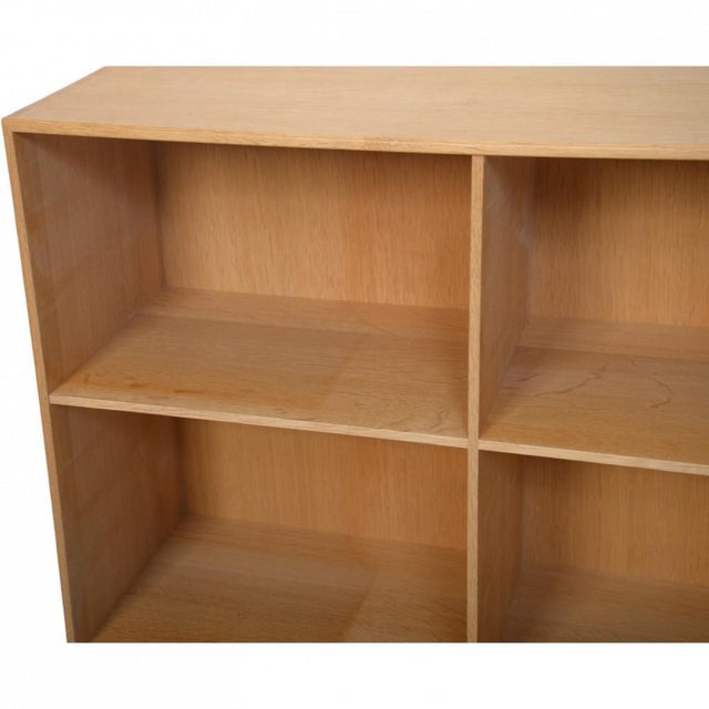 Mogens Koch bookcase made of oak. The bookcase is from the 1980s and appears with some marks and scratches. •Designer:...