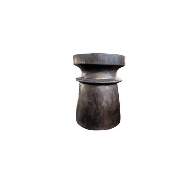 A wonderfully sculptural round side table. Its neutral pigments make it perfect for any space. A uniquely sculptural and...