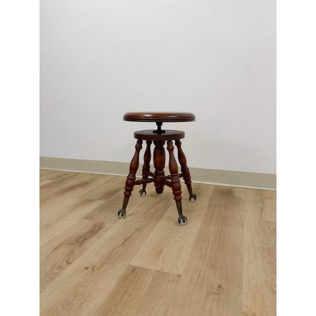 This handsome vintage Victorian adjustable piano stool is a beautifully crafted and characterful collector's find. The...