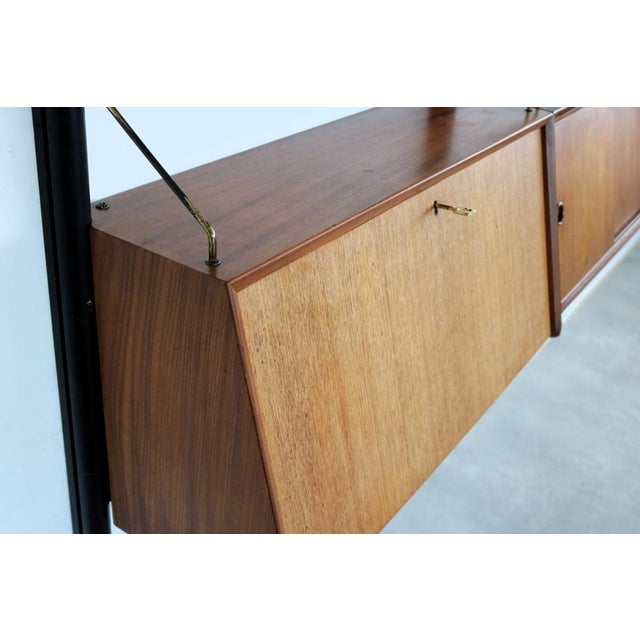 Vintage Wall System in Teak by Louis Van Teeffelen for Wébé, 1960s, in Good conditions. Designed 1960 to 1969 I have...