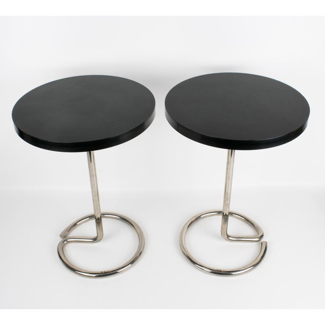 An exceptional pair of modernist Art Deco side tables designed by René Herbst and produced by Stablet in France, circa...
