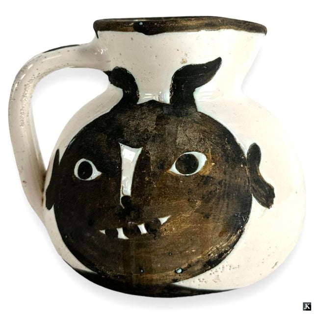 Pablo Picasso (Spain, 1881 - 1973) Glazed Earthenware "Têtes" Pitcher. The Têtes pitcher was created in Vallauris, France...