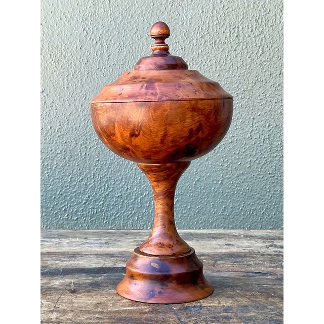 This striking vintage lidded urn is a masterclass in organic modernism and artisanal woodworking. Hand-turned from a...