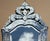 A beautiful antique Italian Venetian wall mirror, circa 1910, with an elegant heart-shaped form and richly decorative...