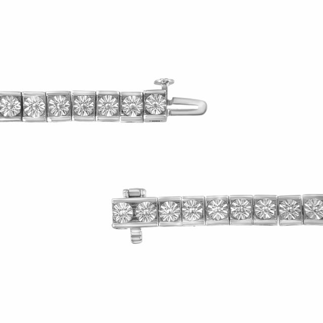 Elevate your style with this classic tennis bracelet with a bold twist. This piece is designed with natural, miracle-set...