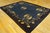 Refined Floral Border on Navy Background and Black Border Antique Chinese Peking Rug For Sale - Image 4 of 10