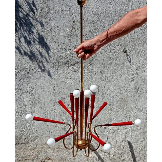 12-arm, 12-light chandelier made by Stilnovo. Attributed for form and style. Electrical system needs redoing. Original...