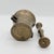 A handsome antique brass mortar and pestle with beautifully aged surfaces and the unmistakable character of a working...