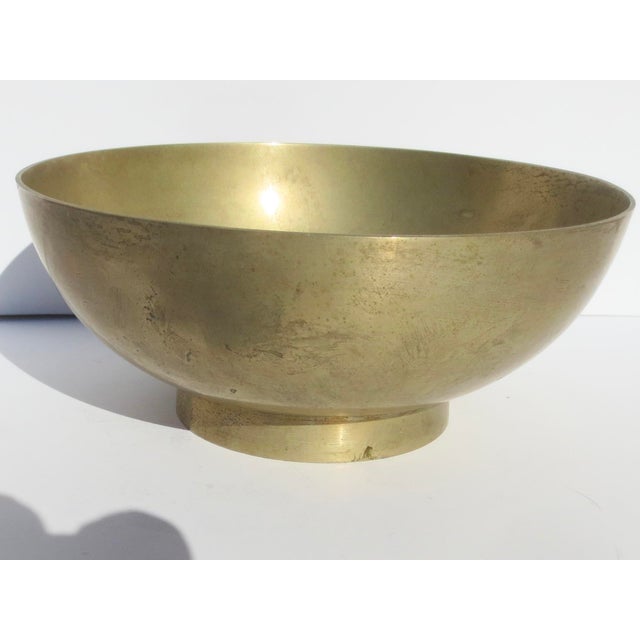 Beautifully scaled brass center bowl for fruits or a big catch-all for the hall. The brass has naturally aged to a soft...