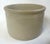 A turn of the century stoneware advertising crock from Red Wing Pottery. It is adorned with an underglaze label from Sam...