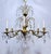 This is a Spanish style bronze chandelier with ornate designed frame and dressed with Swedish style hand cut crystal. It...