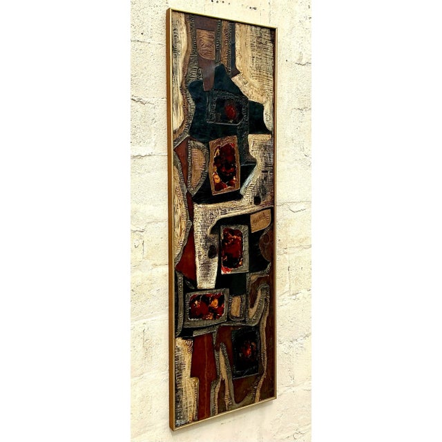 This vintage Mid-Century Modern impasto abstract oil on canvas is a captivating piece with bold textures and dynamic...