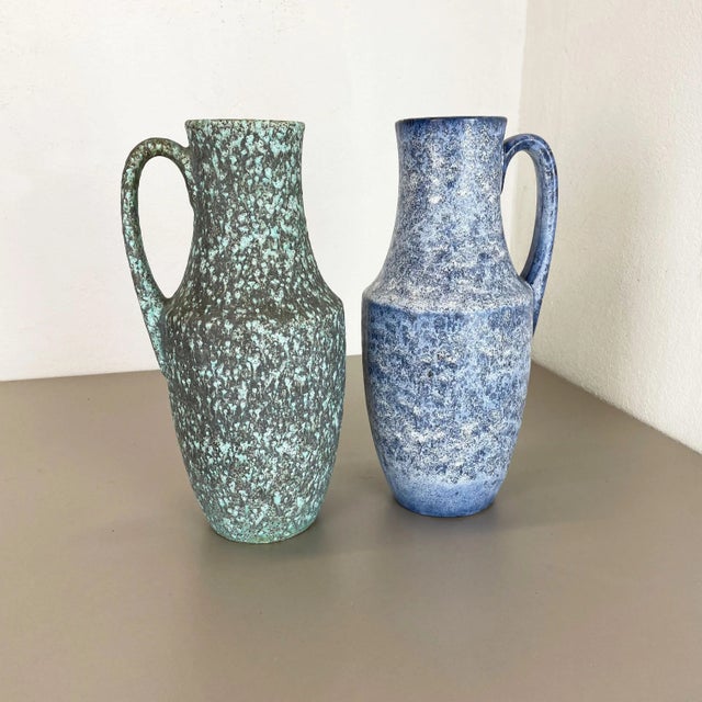 These original vintage vases was produced in the 1970s in Germany Scheurich. They made of ceramic pottery in fat lava...