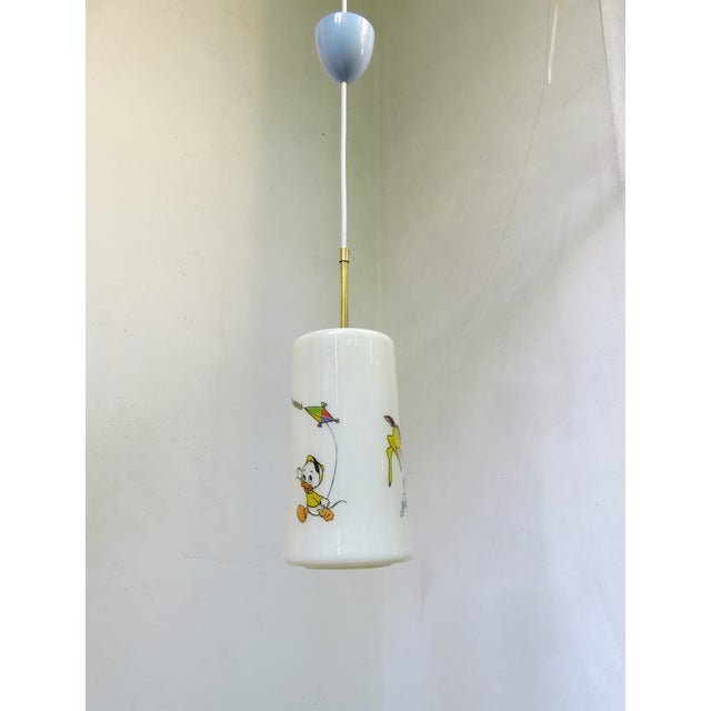 A rare ceiling lamp from Doria, made in the 1950s with three Walt Disney motifs - Bambi and Thumper, Pluto, Huey, Dewey...