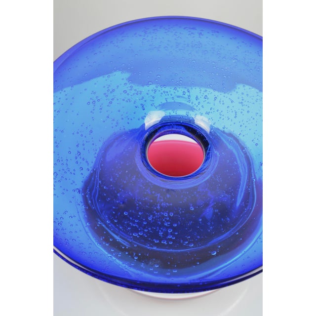 Beautiful hand-blown art glass vase, impressive in both scale and visual impact. This striking piece features a layered...