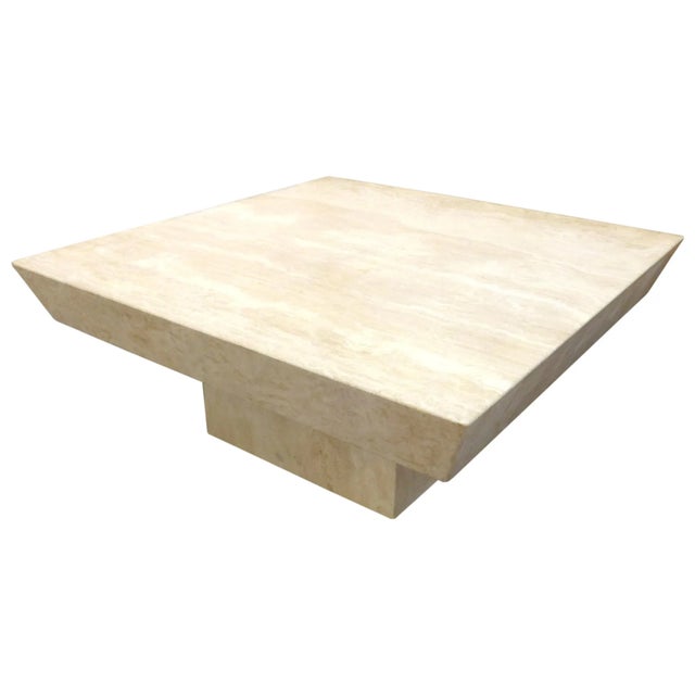 A great, chunky, reverse-bevel, square travertine coffee table. An unexpected, powerful form constructed of travertine...