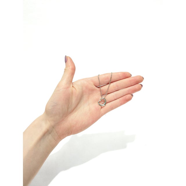 Modern Tiffany & Co Elsa Peretti Open Heart Sterling Silver Pendant for a Necklace For Sale - Image 3 of 12