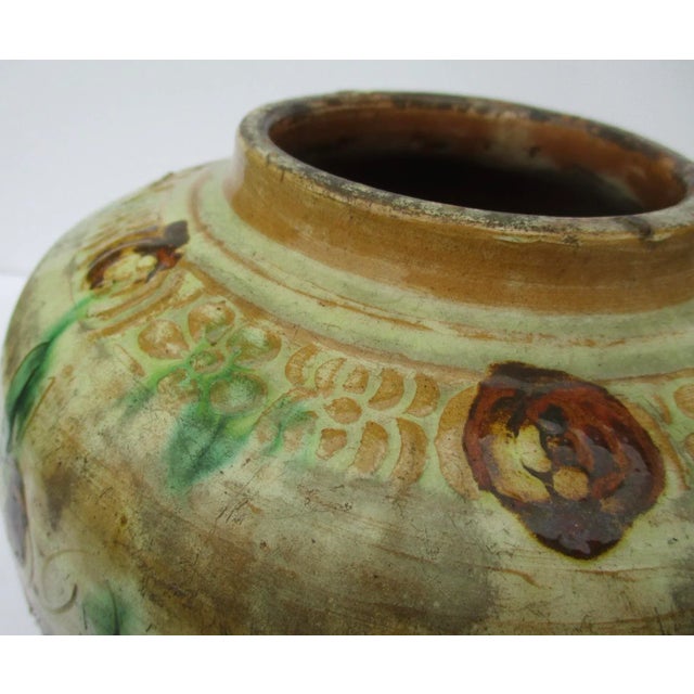 Joseon Dynasty, antique storage jar from Korea, circa 18th century. Built with broad shoulders and a wide bottom suggests...