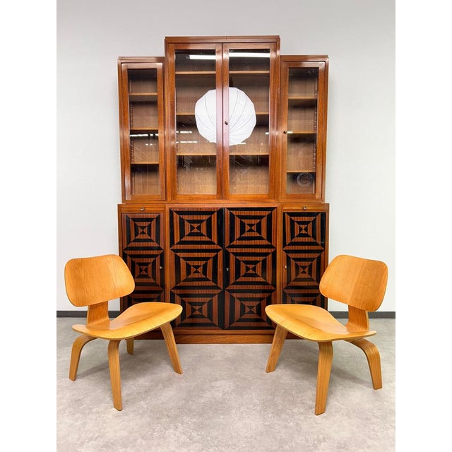Cubist Bookcase with Marquetry, circa 1930 in excellent original condition with small signs of use.
