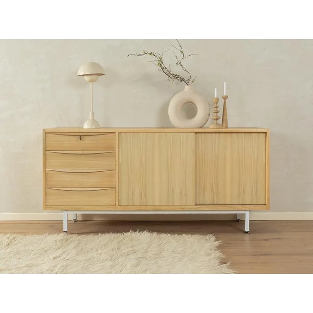 Wonderful partial massive sideboard in the Scandinavian style from the 1950s. Corpus in a bleached walnut veneer with two...