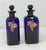 These Bristol Blue Decanters are Rum and Brandy on the front. The backs have gilt grape cluster decoration. They are 3"...