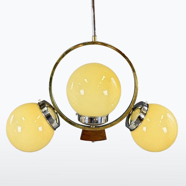 Period: 1930s Style: Art Deco Material: Chromed metal with combination brass, original glass lampshades. Condition:...