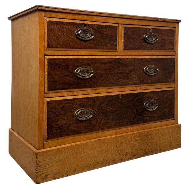 A handsome and finely crafted 19th-century English Victorian chest of drawers, beautifully constructed in oak and...